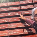 Major Ashwini Kumar Kanva's mother, Smt Subhash Kumari Kanva, solemnly points towards his nameplate at the National War Memorial,