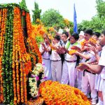 Students pay floral tributes at Capt Sandeep Sankhla War Memorial in Sector-2, Panchkula.