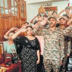 Army personnel along with his wife Smt Priya K G paying tributes to Lance Naik Santosh Kumar