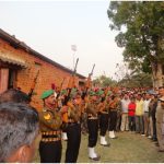 Army personnel giving gun salute to Rifleman Kamta Kumar Mahto