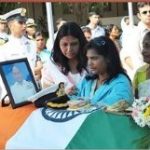 Navy personnel and family members pay their last respects to Cdr Suresh Maurya