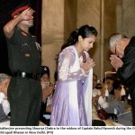 captain A Rahul Ramesh's wife receiving Shaurya Chakra from the President