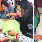 Lt Col Bikramjit Sinngh's father and sister try to console his mother;