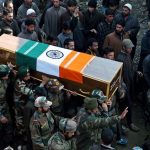 Army officers and jawans carrying the body of martyr L/NK Ghulam Mohi ud din Rather