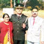 Captain Pawan Kumar SC with his parents